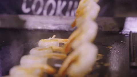 Close-up of Fresh Shrimp Sizzling on a Professional Grill Stock Footage 337440484