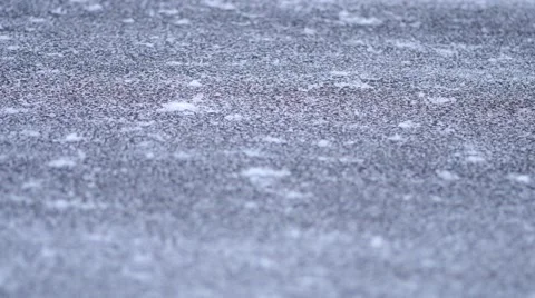 Close up of fresh snow falling on the roadway Stock Footage 45544449