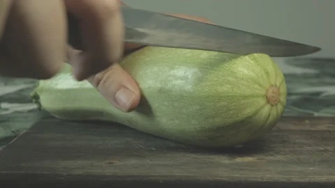Close up of fresh squash cut in slices with knife Stock Footage 134069248