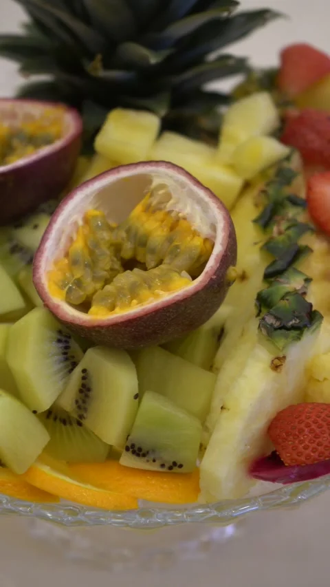 Close Up of Fresh Tropical Fruit Platter with Passion Fruit Stock Footage 340325223