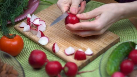 Close up, fresh vegetable cutting process radishes, vegetarian, healthy food, di Stock Footage 107867291