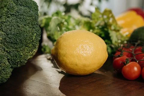 Close-up of fresh vegetables on the kitchen table. Vegetarian food concept Stock Photos