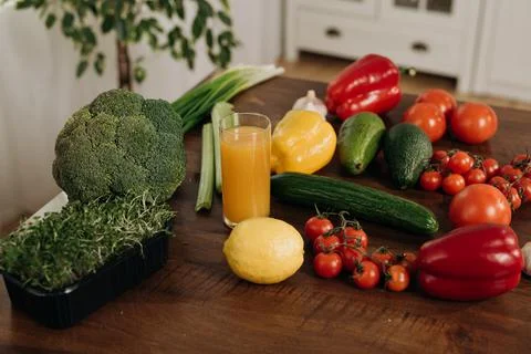Close-up of fresh vegetables on the kitchen table. Vegetarian food concept Stock Photos