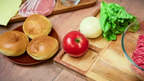 Close-up fresh vegetables on the table with grind beef mince in 4K. Stock Footage 153721651