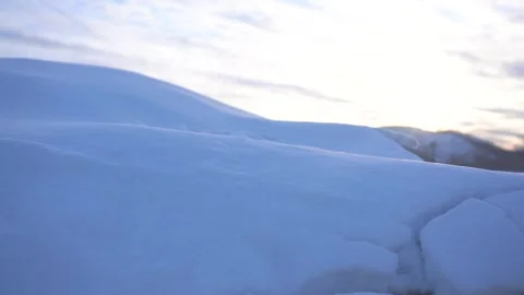 Close up of fresh white snow surface in a serene winter mountain landscape Video stock 342212139