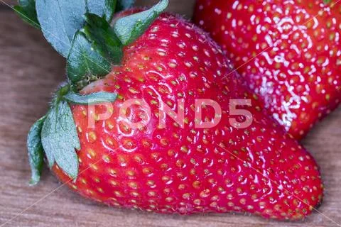 Close up of fresh whole ripe organic strawberries Stock Photos