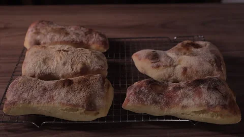 Close-up of freshly baked artisan bread with crispy crust Stock Footage 331216794