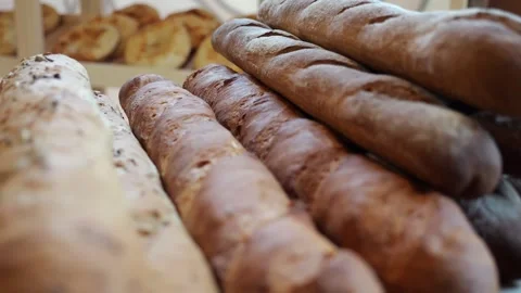 Close-up of freshly baked bread on the shelf of a store or bakery. Stock Footage 339786916