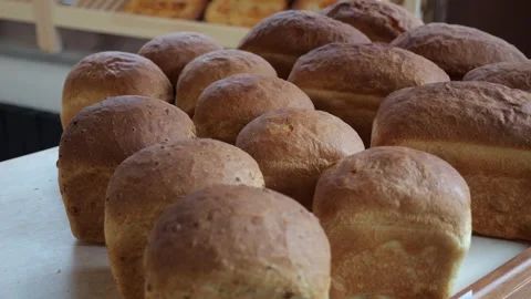 Close-up of freshly baked bread on the shelf of a store or bakery. Stock Footage 339787115