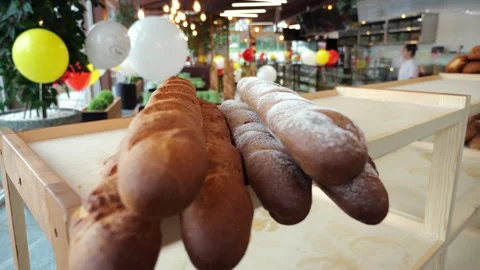 Close-up of freshly baked bread on the shelf of a store or bakery. Stock Footage 339787256