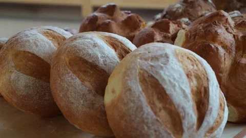 Close-up of freshly baked bread on the shelf of a store or bakery. Stock Footage 339787349