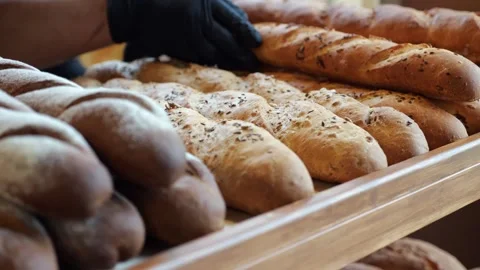 Close-up of freshly baked bread on the shelf of a store or bakery. Stock Footage 340245731