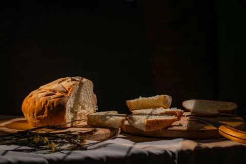 Close up of Freshly Baked Bread with Slices Stock Photos