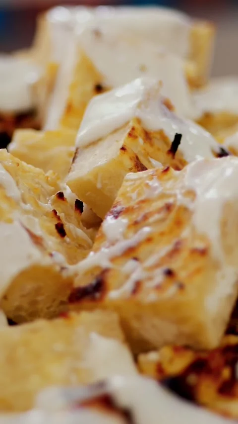 Close-up, freshly baked curd casserole with white icing. Stock Footage 320535795