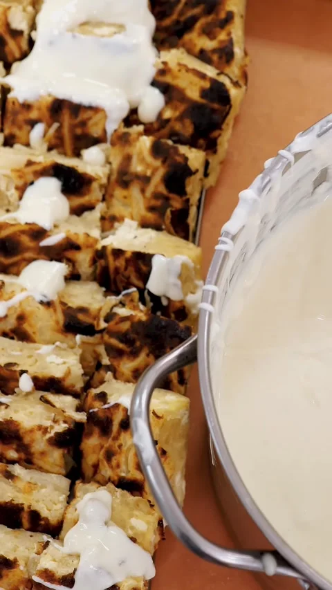 Close-up, freshly baked curd casserole with white icing. Stock Footage 320611246