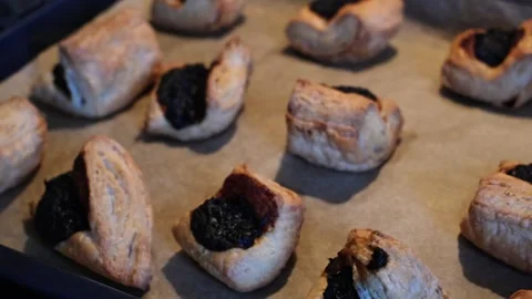 Close-up of freshly baked hot Leaf Fat Pastry on a baking tray Stock Footage 270598703