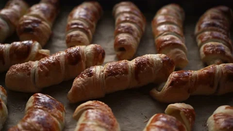 Close up of freshly baked puff pastry buns with fruits Stock Footage 236910002