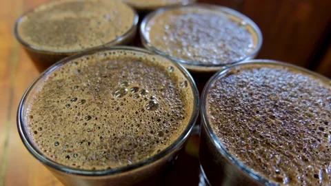 Close up of freshly brewed coffee from recent crop harvest for quality Stock Footage 219867544