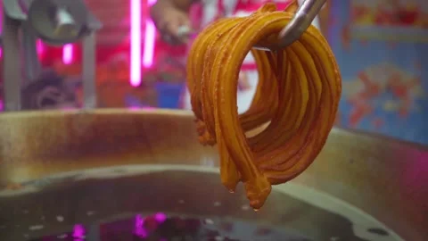 Close-up of freshly-cooked churros Stock Footage 295450806