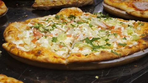 Close-up of freshly cooked pizzas. Stock Footage 303625275
