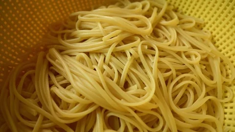 Close Up of Freshly Cooked Spaghetti with Rising Steam in Bowl Stock Footage 340954794