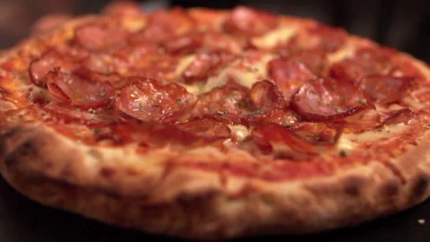 Close-up of a freshly made pizza. Video stock 146472256