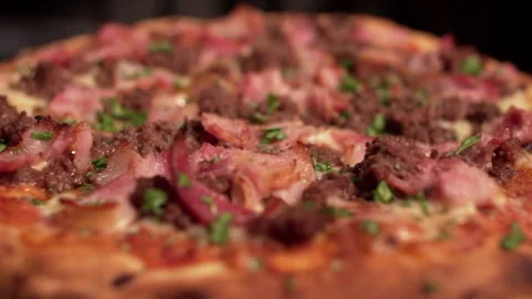 Close-up of a freshly made pizza. Stock Footage 148178439