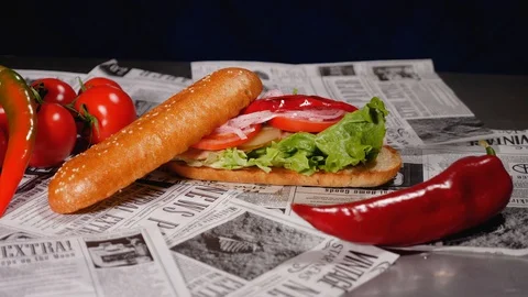 Close-up of a freshly prepared mackerel burger. Slider shot. Stock Footage 128292576
