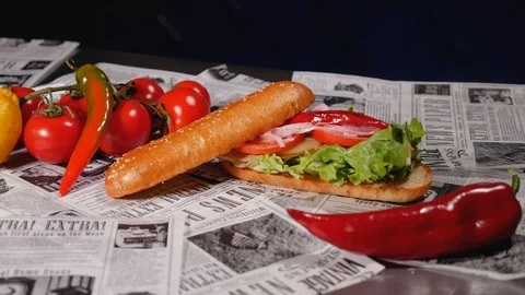 Close-up of a freshly prepared mackerel burger. Slider shot. Stock Footage 128292856