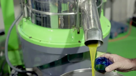 Close Up On freshly squeezed olive oil spills in factory 4K 60fps Stock Footage 219615353