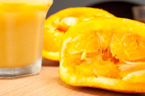 Close up of a freshly squeezed orange halves Stock Photos