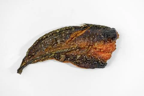 A close up of fried catfish in a white background Stock Photos