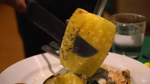 Close-up of fried cheese with black olive on stick Stock Photos