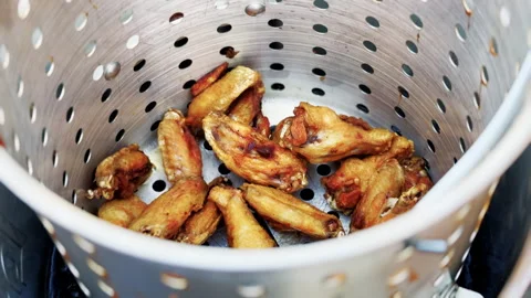 Close Up Of Fried Chicken Wings In Basket Stock Footage 346649047