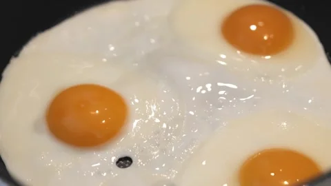 Close Up Fried Egg Cooking in Hot Pan Stock Footage 342667342