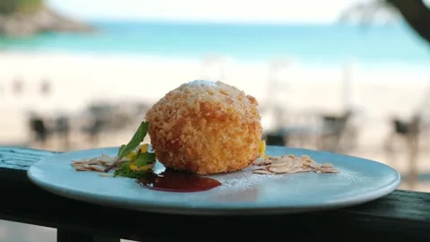 Close-up of fried ice cream with jam topping. 库存影片 247057320