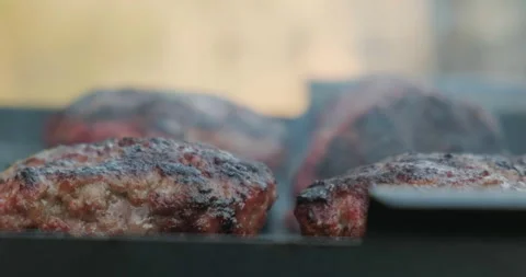 Close up of Fried Meat Cutlets. Cooking Meat on Grill. Crispy crust. Meat Done Stock Footage 132982814