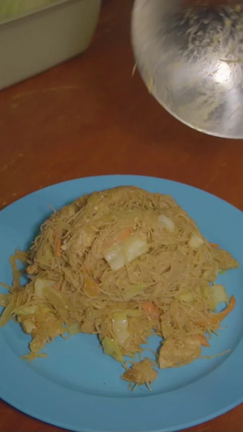Close up of Fried Mee Siam Platted in blue plate Stock Footage 318918730
