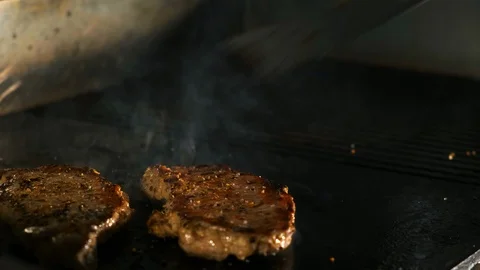 Close-up of fried pork meat in a restaurant kitchen 库存影片 119092985