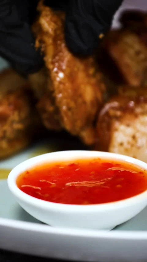 Close-up of fried pork ribs, vertical 4k video Stock Footage 281966762