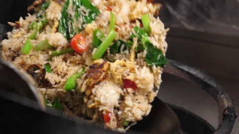 Close up of fried rice with vegetables and meat in a wok Stock Footage 225460556