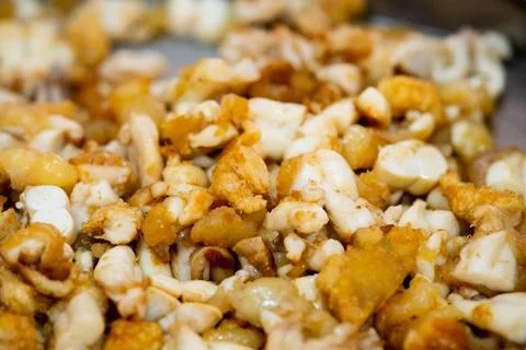 Close up of fried squid egg, thai street food market Stock Photos