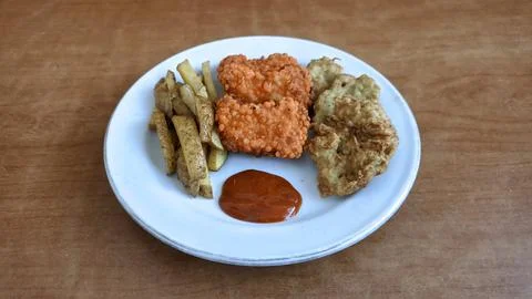 Close up fried with various type of food on plate Stock Photos