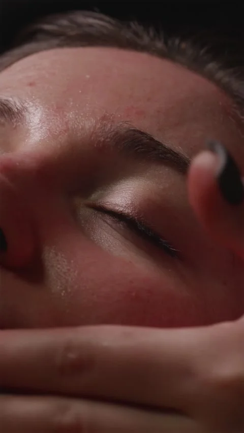 Close up of friend gently spreading moisturizing face cream on girl's forehea 스톡 동영상 344877034