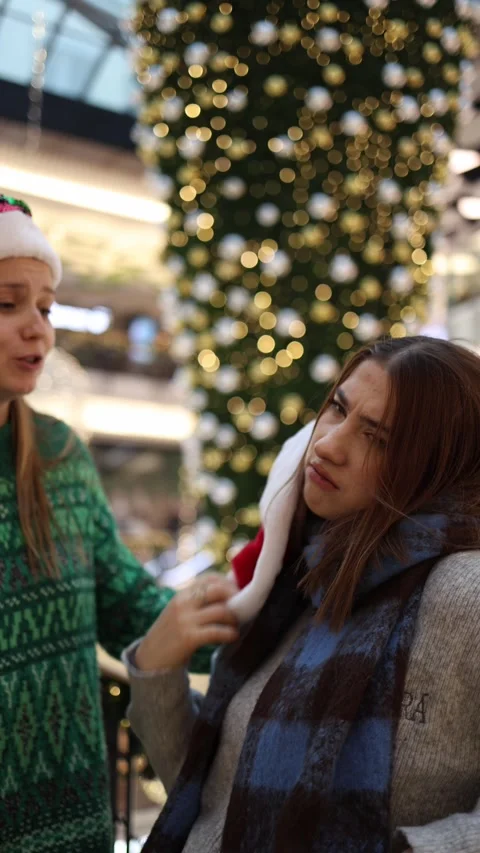 Close friends as one talks while the other looks annoyed and tired Video stock 324814840