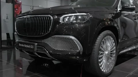 Close up of front end, grille, headlights of new black SUV Mercedes Maybach GLS Vidéo 218282241