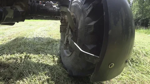 A close-up of the front tractor wheel. Stock Footage 113704774