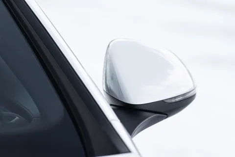 Close up front view of car side mirror. Front rear view mirror on the car win Foto stock