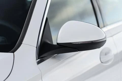 Close up front view of car side mirror. Front rear view mirror on the car win 스톡 사진