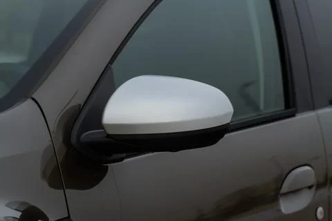 Close up front view of car side mirror. Front rear view mirror on the car win Foto stock